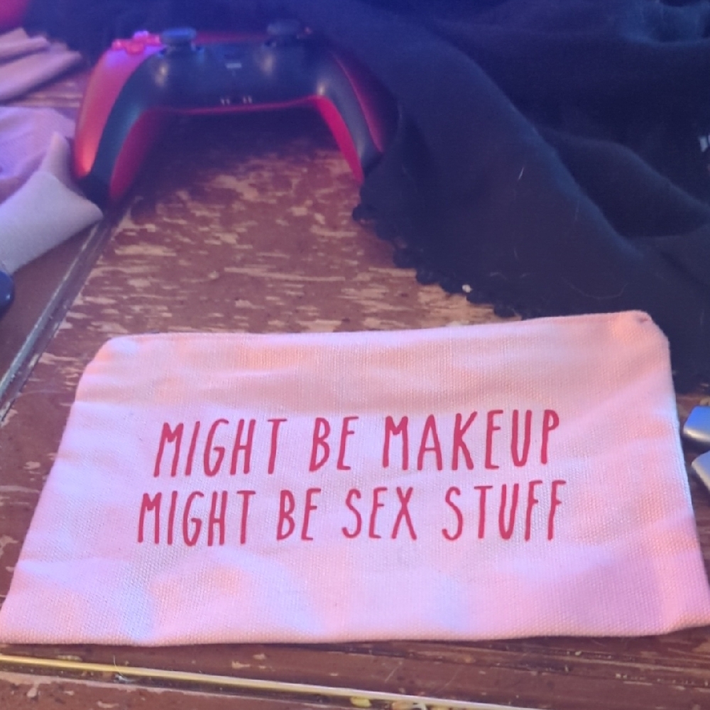 Pink Pouch with Red Text